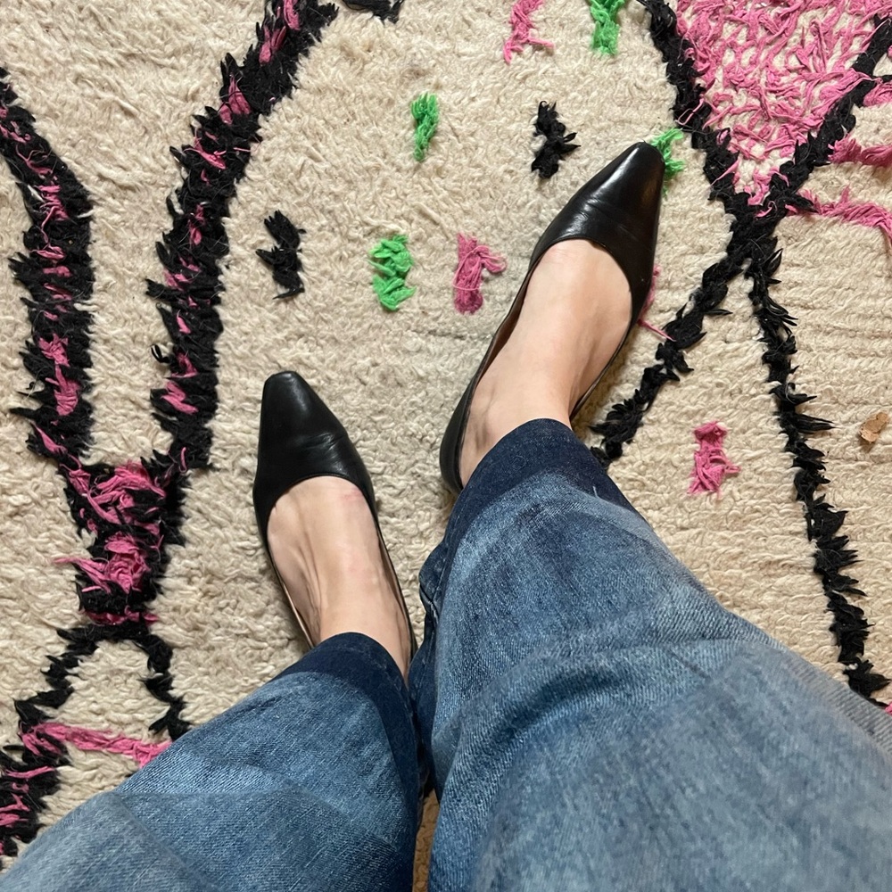 Black leather ballet flats